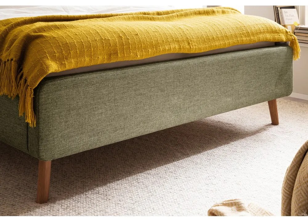 Zelená čalúnená dvojlôžková posteľ s úložným priestorom s roštom 160x200 cm Lotte – Meise Möbel