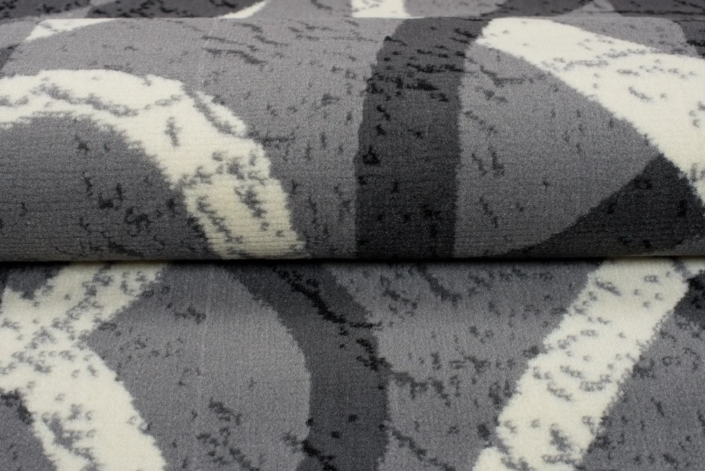 TA Koberec 3707A TMAVO SIVÁ LACNÁ PP CRM Rozmer: 70x250 cm