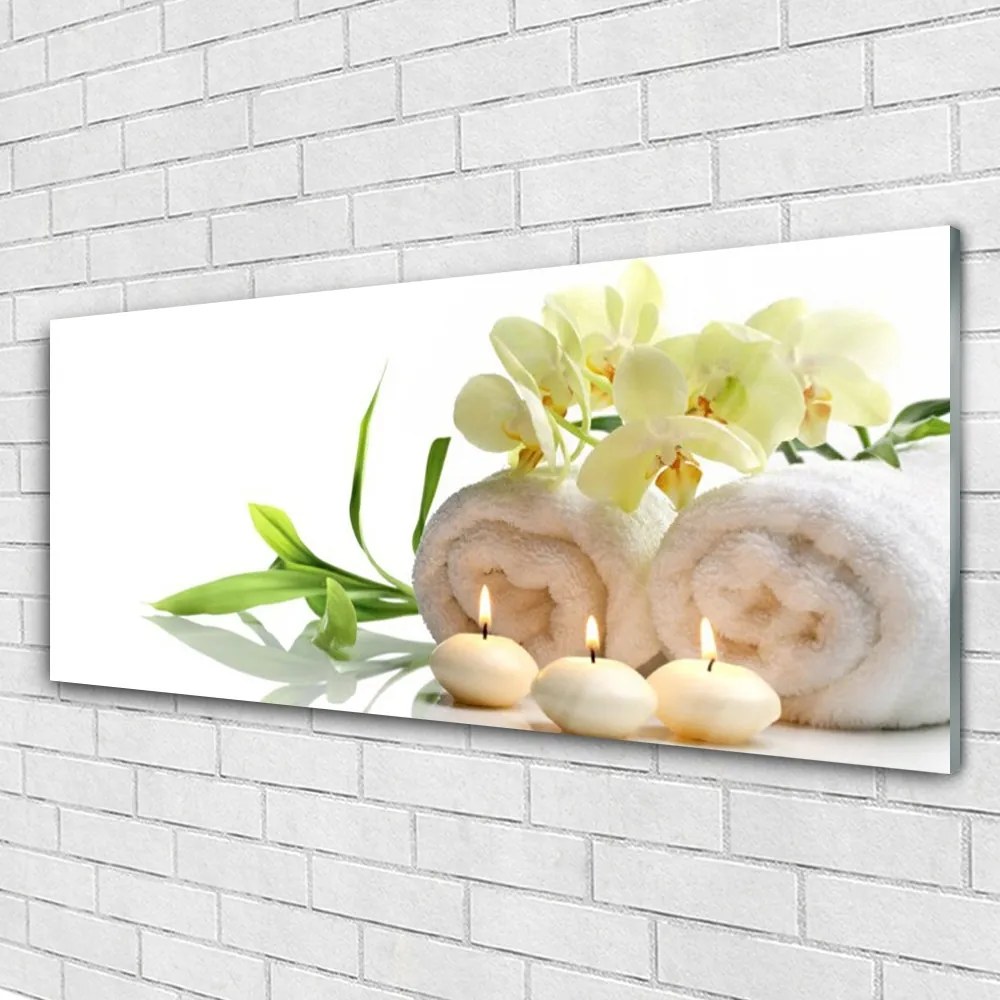 Obraz plexi Kúpele uteráky sviece orchidea 125x50 cm