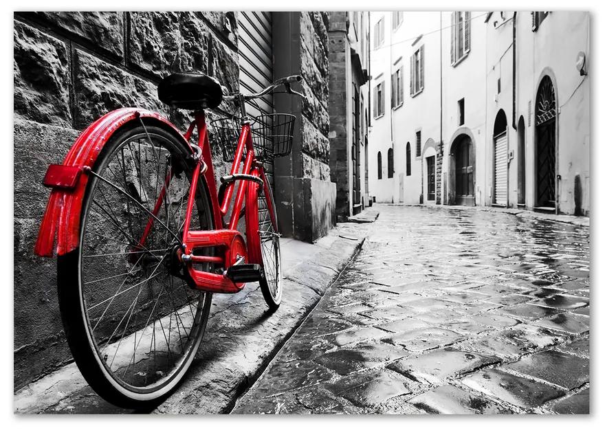 Foto obraz sklenený horizontálne Červené koleso pl-osh-100x70-f-95275197