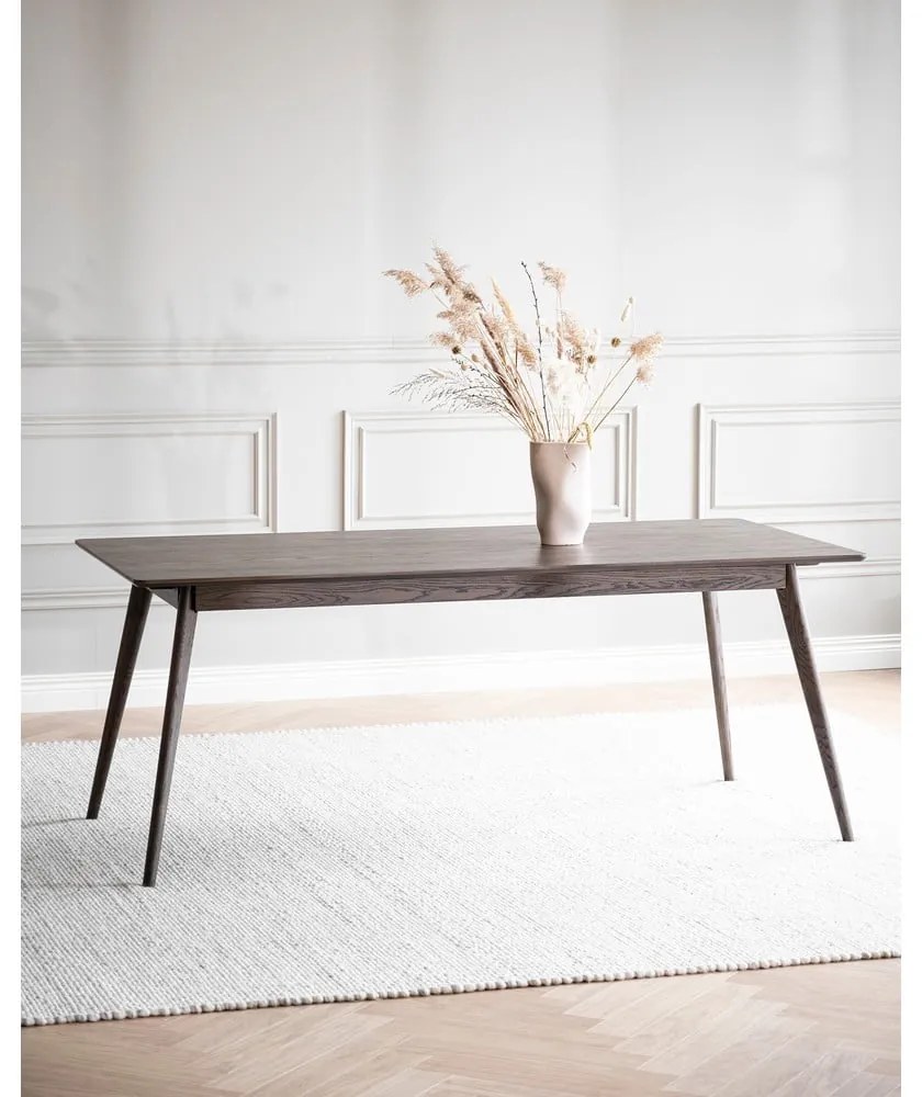 Tmavohnedý rozkladací jedálenský stôl v dekore duba 90x190 cm Yumi – Rowico