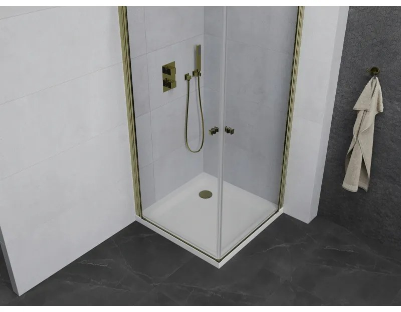 Mexen Pretoria Duo, sprchovací kút s 2-krídlovými dverami 70 (dvere) x 70 (dvere) cm, 6mm číre sklo, zlatý profil + slim sprchová vanička 5cm biela so zlatým sifónom, 852-070-070-50-02-4010G