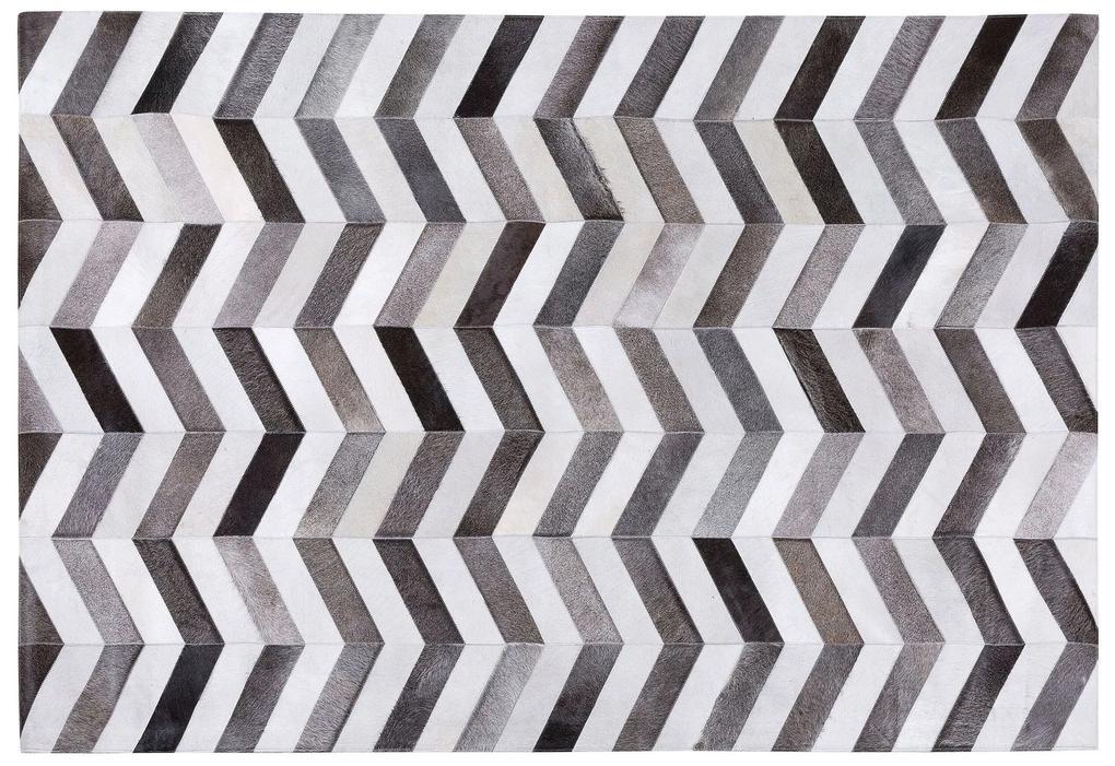 Kožený koberec 140 x 200 cm sivá/hnedá AKSAZ Beliani