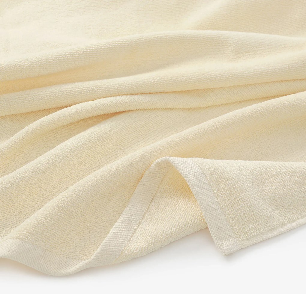 Goldea bavlnený froté uterák / osuška soft bez bordúry – smotanový 70 x 140 cm