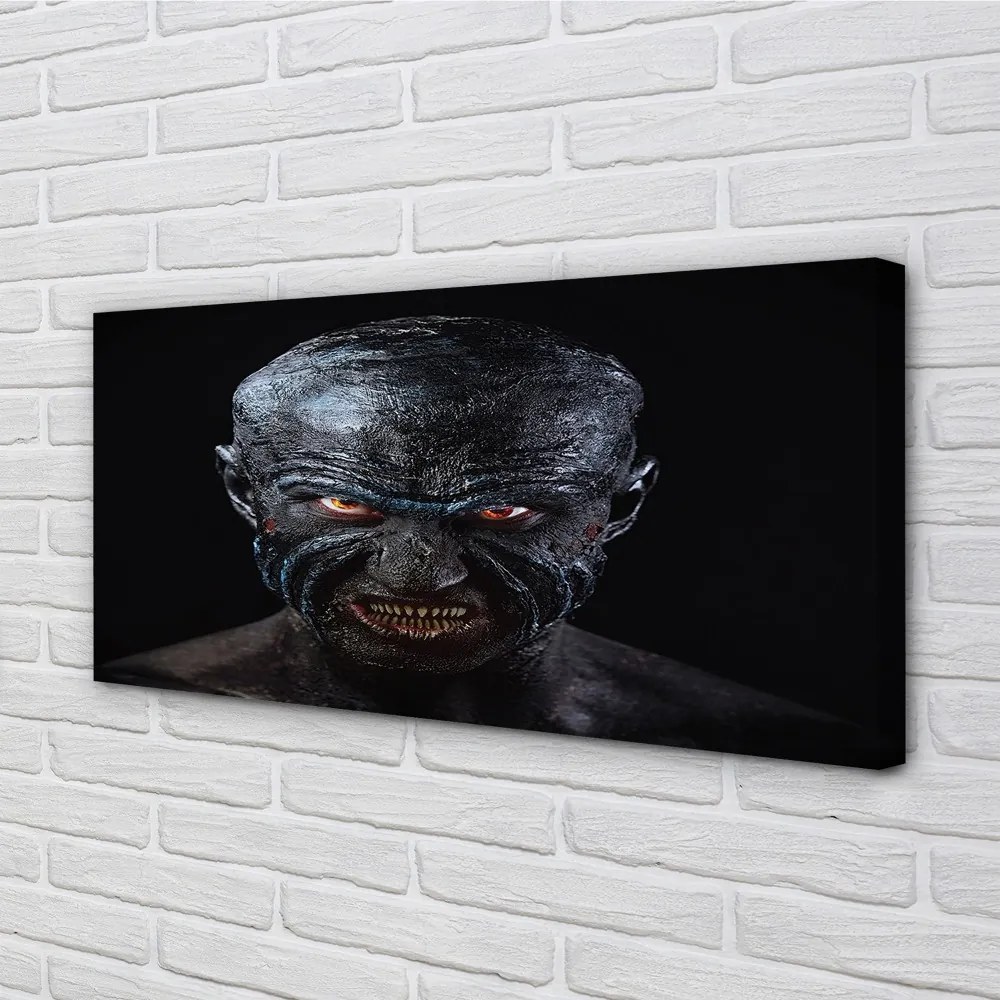 Obraz canvas Strašná plešatý postava s červenými očami 140x70 cm
