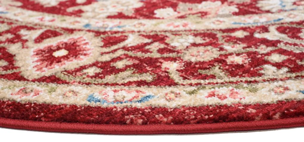 Okrúhly vintage koberec červenej farby