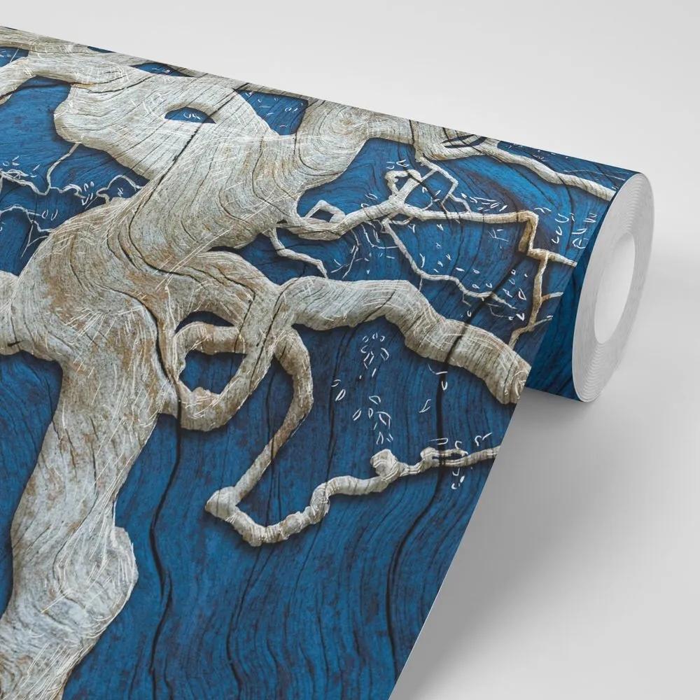 Samolepiaca tapeta abstraktný strom na dreve s modrým kontrastom - 450x300