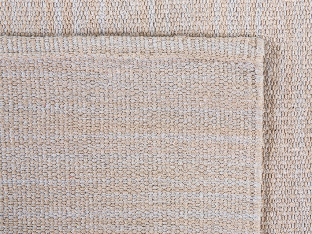 Bavlnený koberec 140 x 200 cm béžový DERINCE Beliani