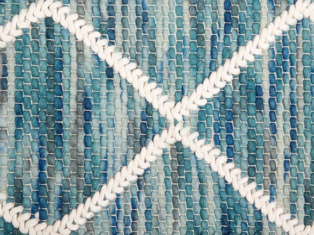 Vlnený koberec 140 x 200 cm modrá/biela BELENLI Beliani