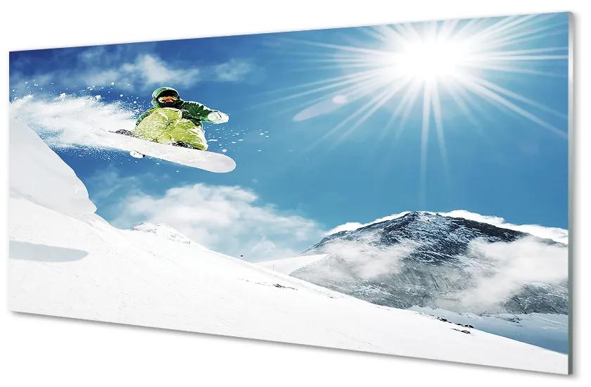 Obraz na skle Man mountain snow board 140x70 cm