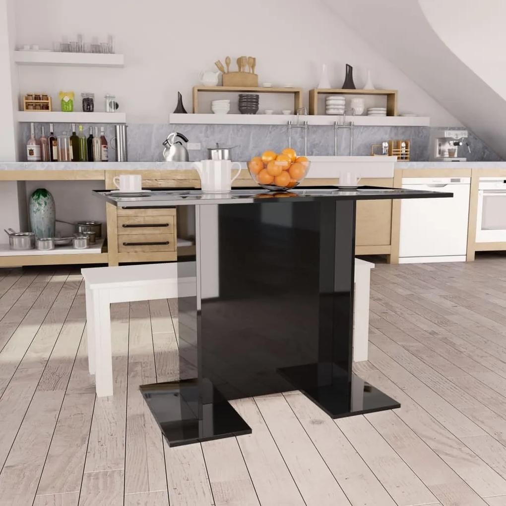 vidaXL Jedálenský stôl lesklý čierny 110x60x75 cm drevotrieska