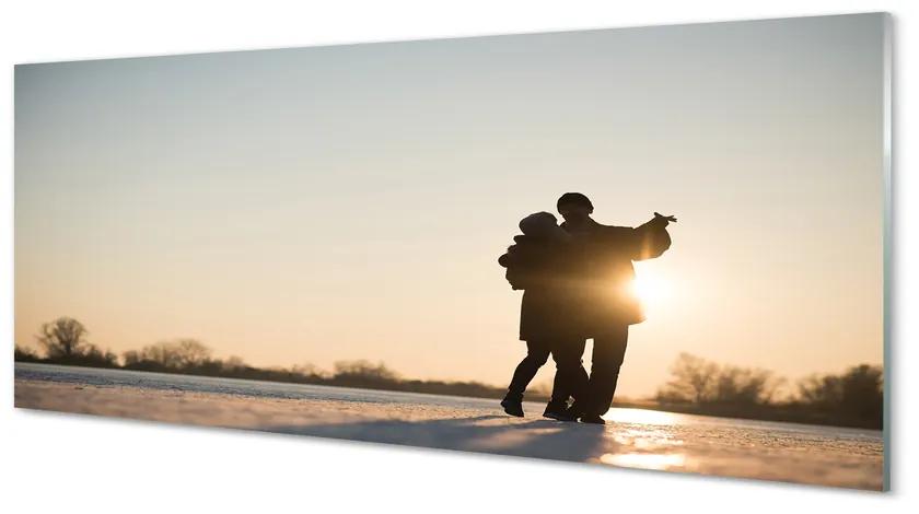 Obraz plexi Ľudia tancujú v zime 120x60 cm