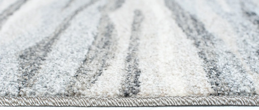 TA Koberec K186A STREDNE SIVÉ SARI B1X Rozmer: 70x200 cm