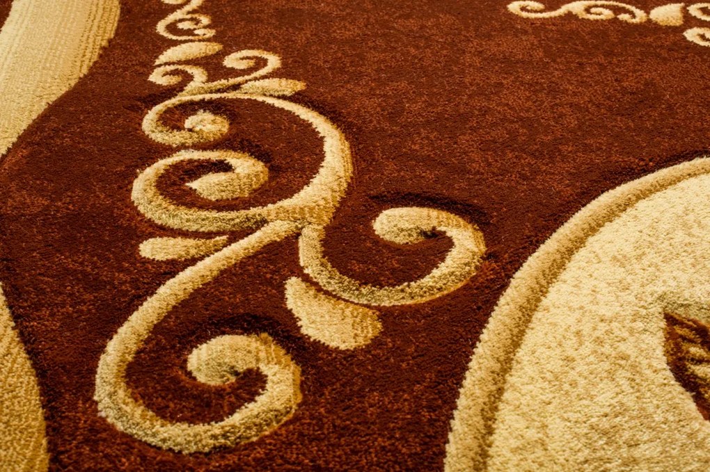 TA Koberec 8300A HNEDÁ ANTOGYA Rozmer: 110x265 cm