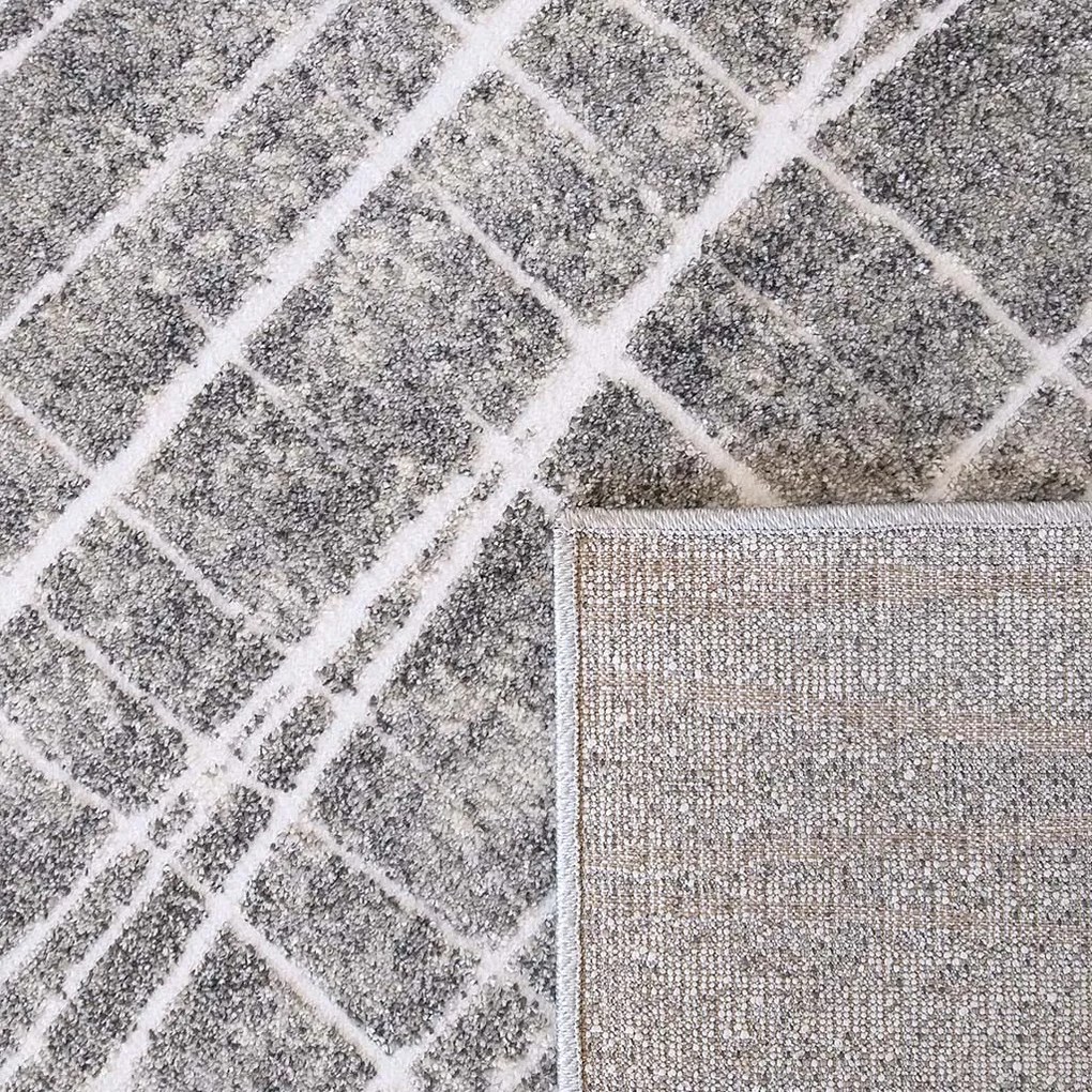 DY Sivý koberec s bielymi linkami Enigma 05 Rozmer: 160x220 cm