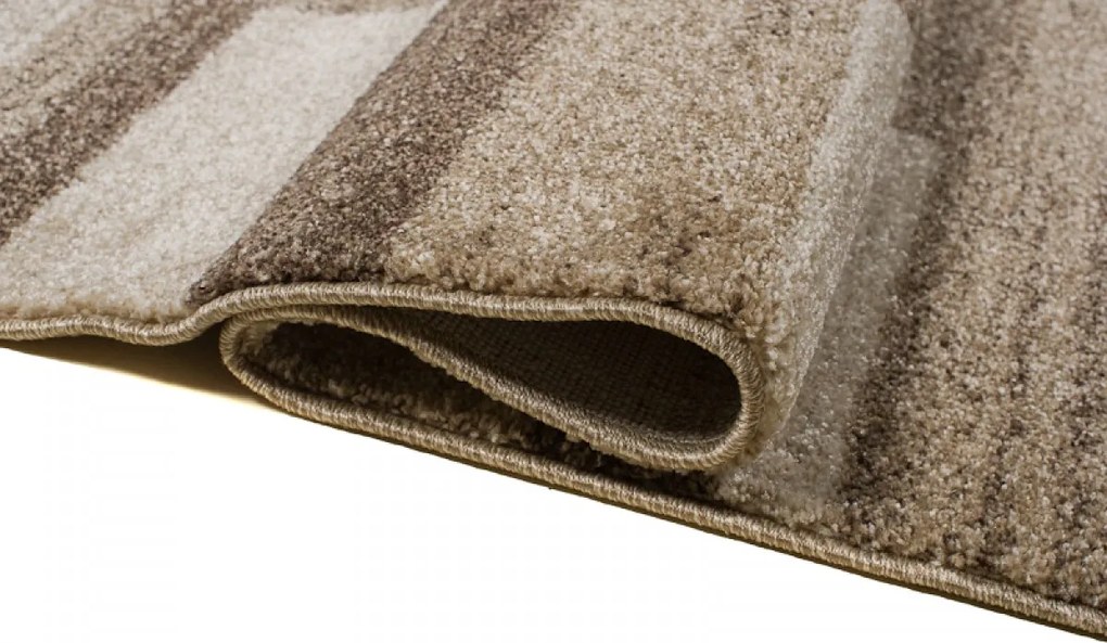 TA Koberec 3438A TMAVOBÉŽOVÉ SÁRÍ 3UX Rozmer: 80x150 cm