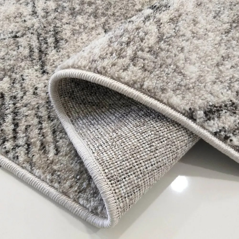 Moderný béžový koberec s jemným vzorom Šírka: 60 cm | Dĺžka: 100 cm