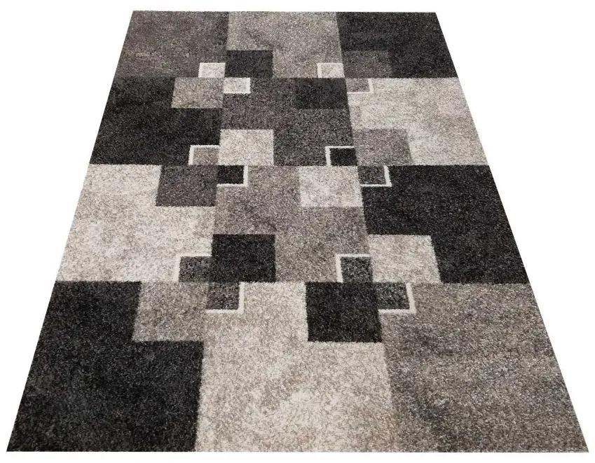 Originálny koberec s motívom štvorcov béžovej farby Šírka: 80 cm | Dĺžka: 150 cm
