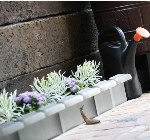 Prosperplast Záhradná palisáda Snail proti slimákom sivá