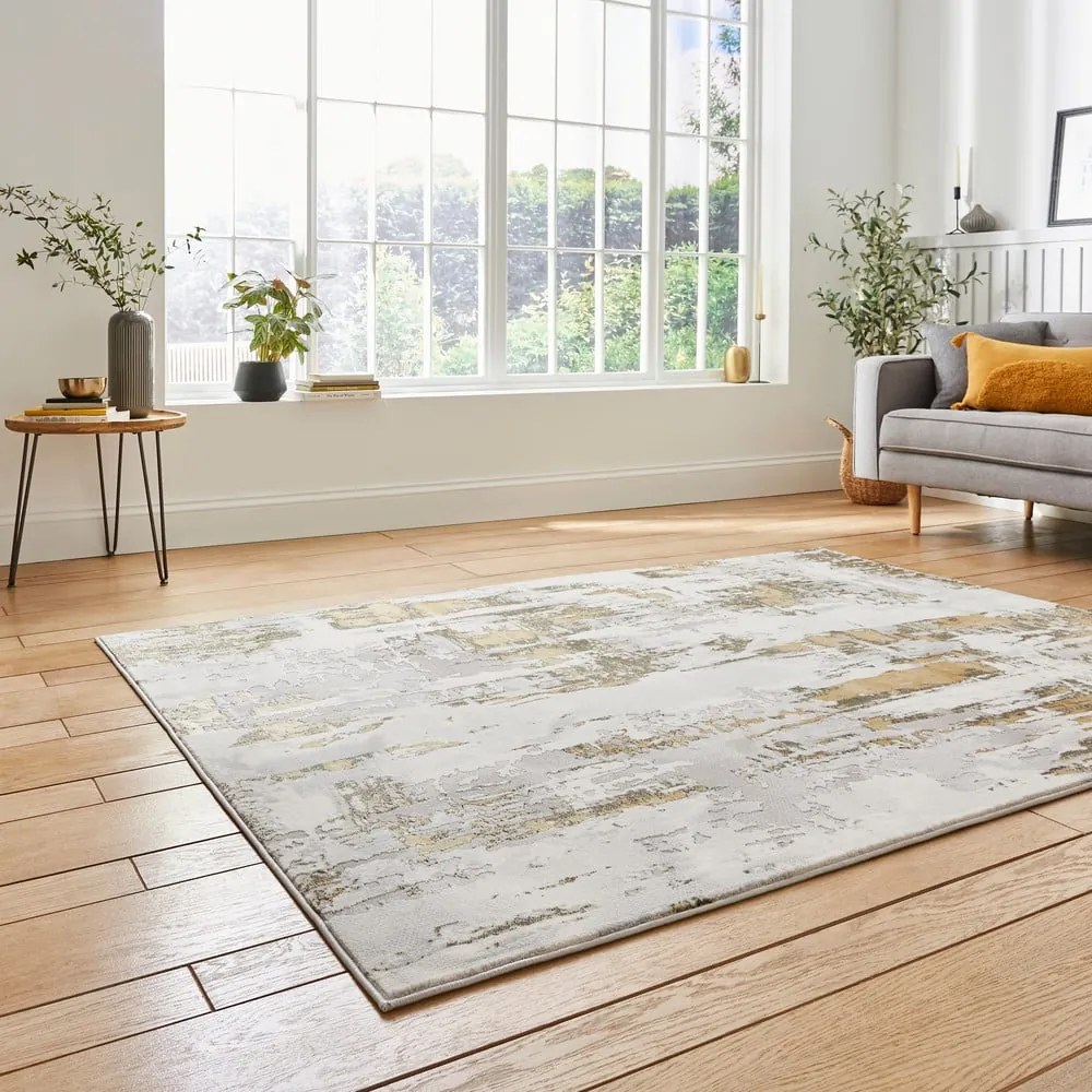 Šedý/v zlatej farbe koberec 170x120 cm Apollo - Think Rugs