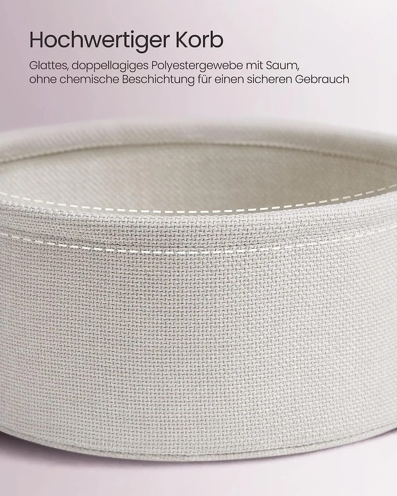 Okrúhly príručný stolík s látkovým košíkom, pastelovo ružový