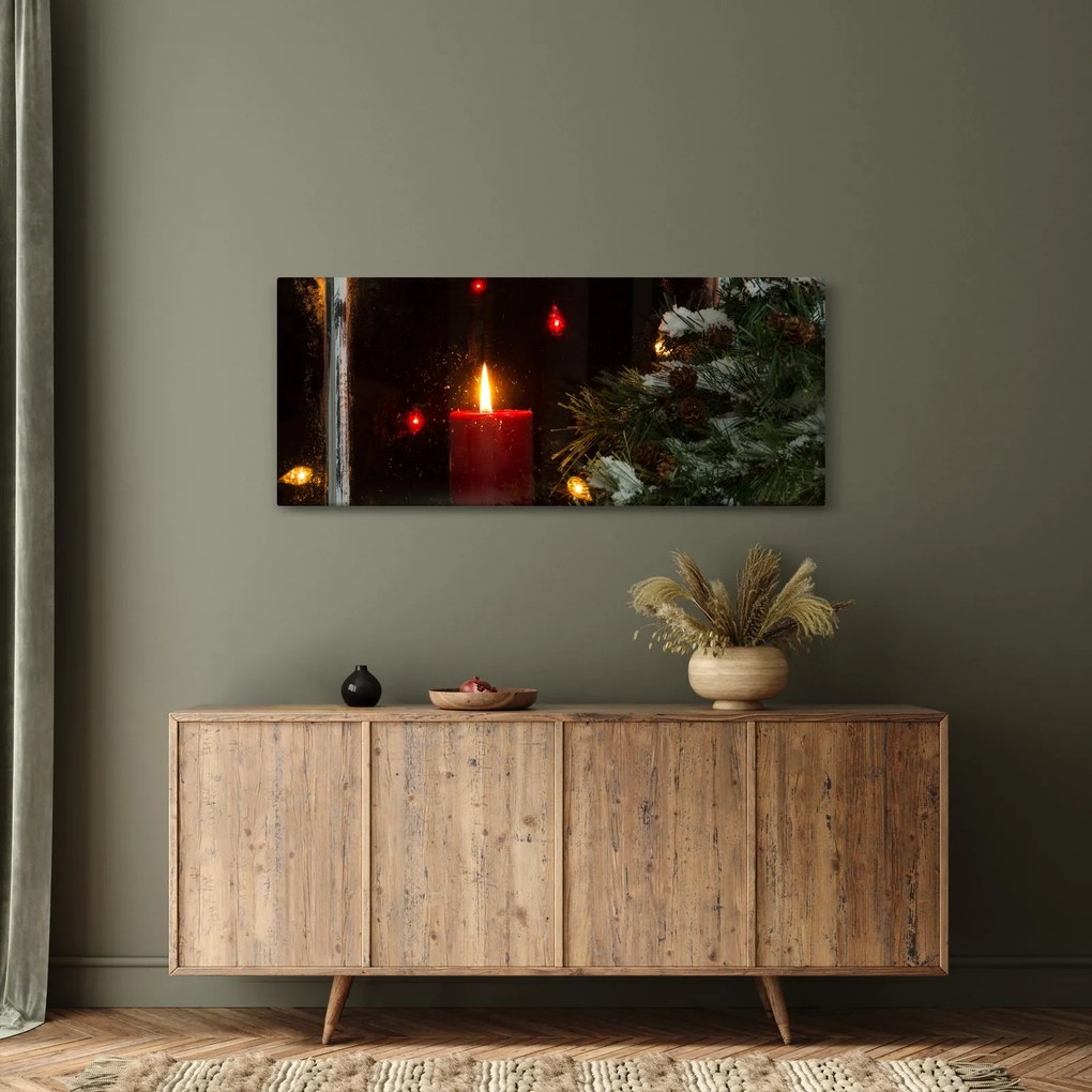 Obraz - Žiariaca vianočná sviečka (120x50 cm)