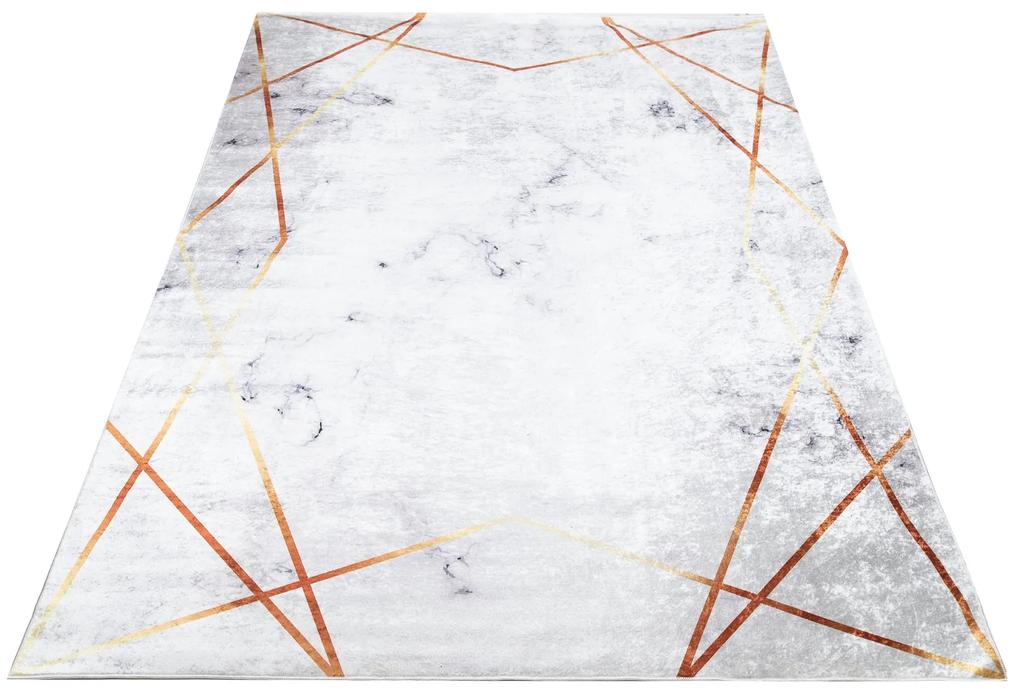 Sivý trendový koberec s jednoduchým zlatým vzorom