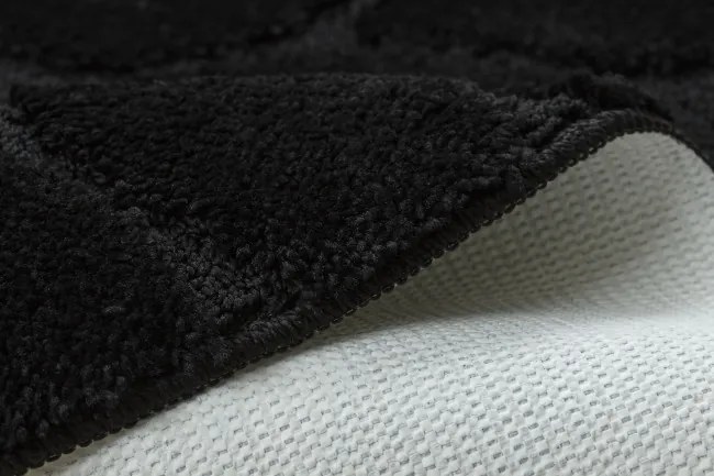 Kúpeľňový koberček SUPREME STONES kamienky, čierny kruh