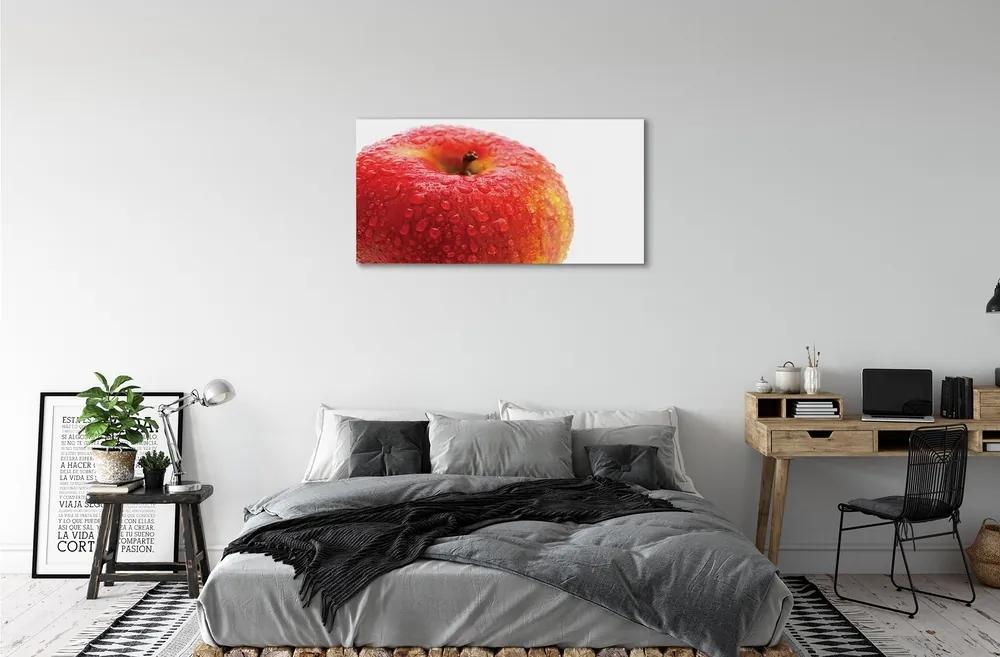 Obraz na skle Kvapôčky vody na jablko 100x50 cm