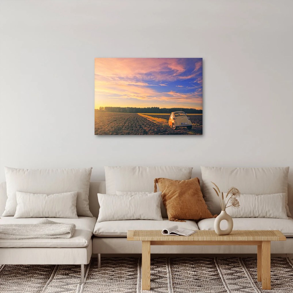 Obraz žltého auta v poli (70x50 cm)
