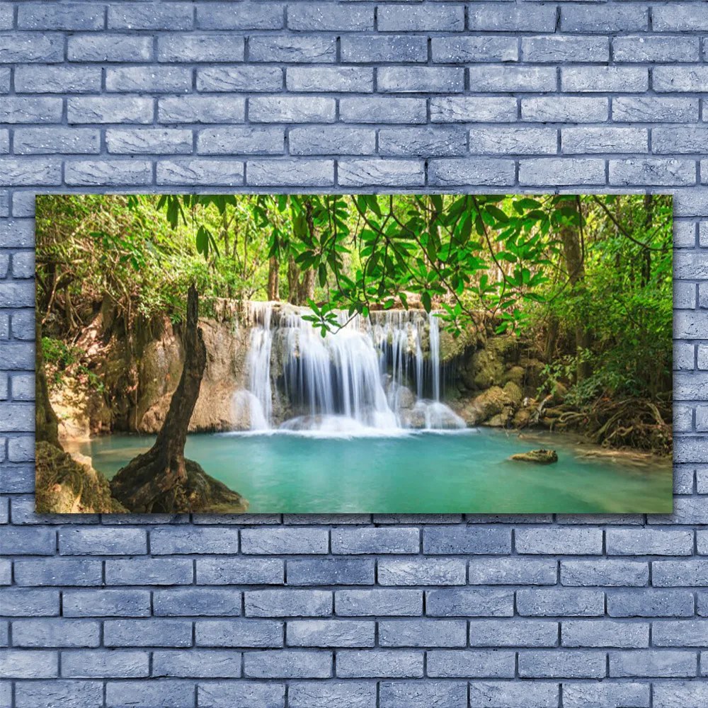 Obraz plexi Vodopád jazero les príroda 120x60 cm