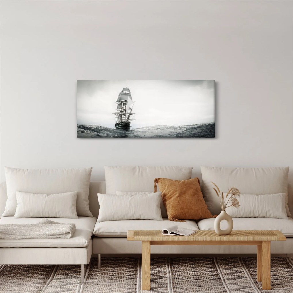 Obraz - Loď plávajúca po oceáne (120x50 cm)