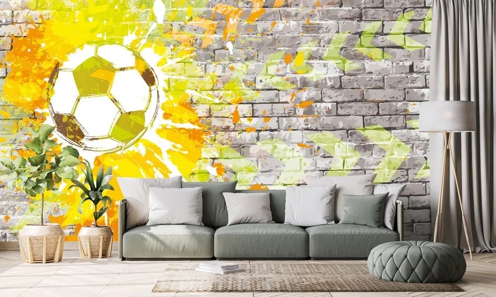 Tapeta futbalová lopta na tehlovej stene - 150x100