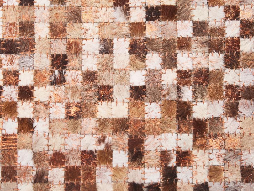 Kožený koberec 140 x 200 cm hnedá/béžová TORUL Beliani