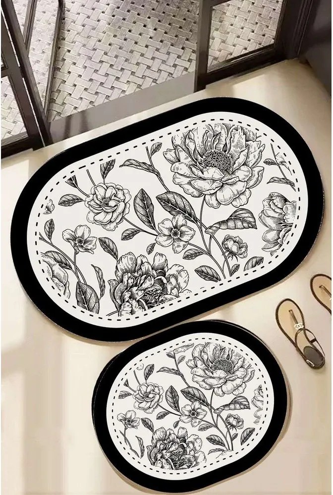 Čierno-biele kúpeľňové predložky v súprave 2 ks 60x100 cm Rasse – Foutastic