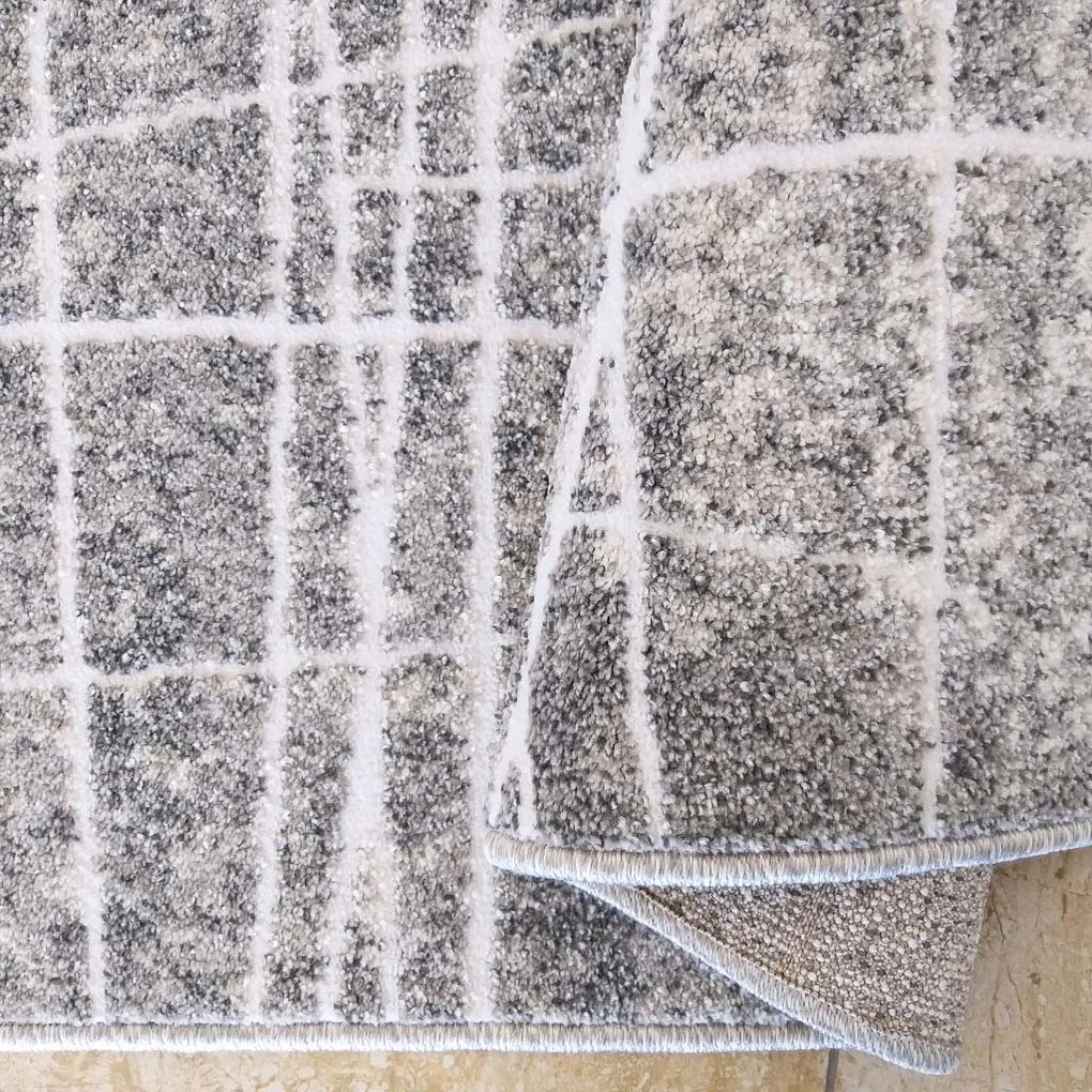 DY Sivý minimalistický koberec s bielymi linkami Enigma 05 Rozmer: 200x290 cm