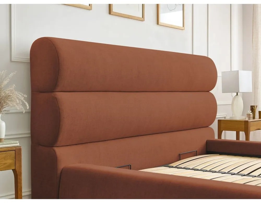 Oranžová čalúnená dvojlôžková posteľ s úložným priestorom s roštom 180x200 cm Jagna – Bobochic Paris