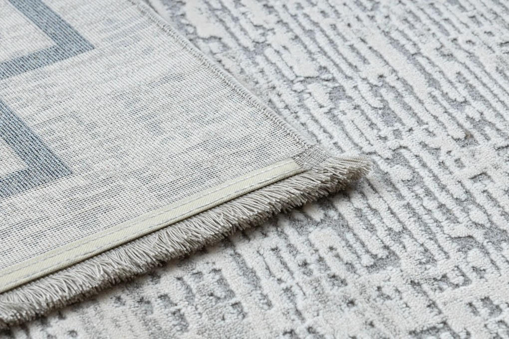 Koberec TULS 51242 s rámikom, slonovinová modrá