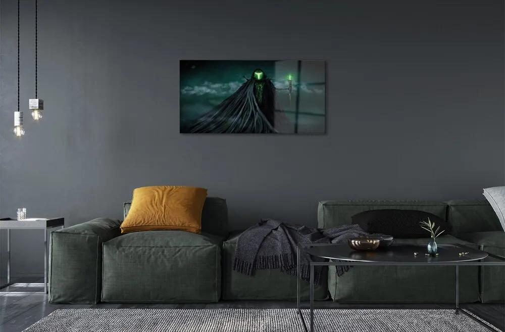 Sklenený obraz Temná postava zeleného ohňa 125x50 cm