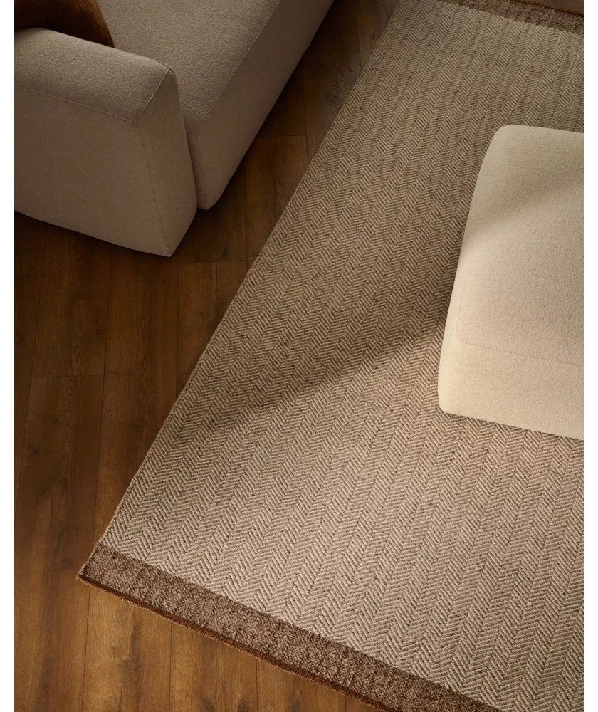 Béžový obojstranný ručne tkaný vlnený koberec 160x230 cm Nifelia – Kave Home