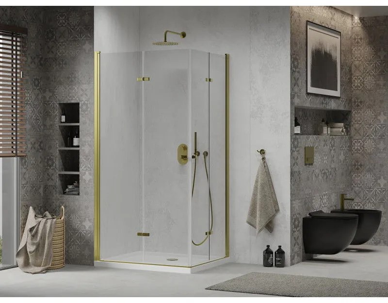 Mexen Lima Duo, sprchový kút so skladacími dverami 100 (dvere) x 90 (dvere) cm, 6mm číre sklo, zlatý profil + slim sprchová vanička biela + zlatý sifón, 856-100-090-50-02-4010G