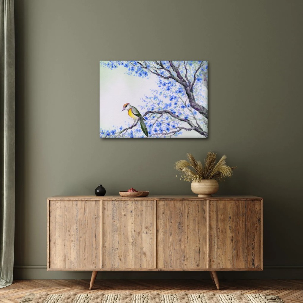Obraz - Vtáčik na strome s modrými kvetmi (70x50 cm)