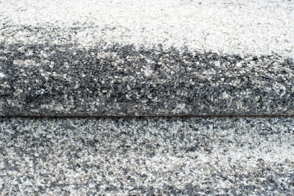 TA Koberec K206A TMAVOSIVÉ SARI B1X Rozmer: 100x200 cm