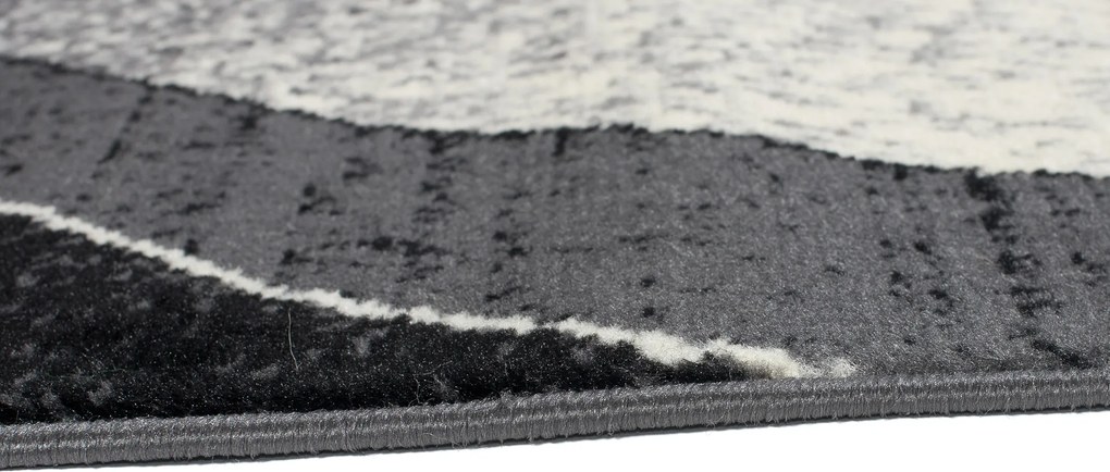 TA Koberec K857A TMAVO SIVÁ LACNÁ PP CRM Rozmer: 100x250 cm