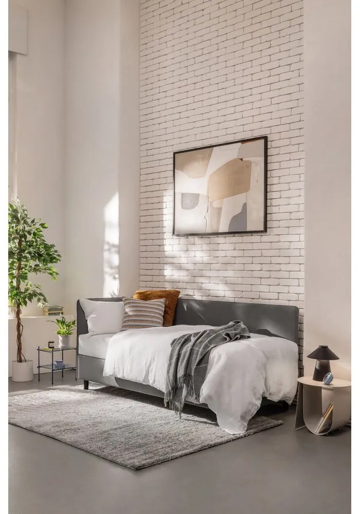 Sivá čalúnená jednolôžková posteľ s úložným priestorom s matracom 90x200 cm Avela – Bonami Selection