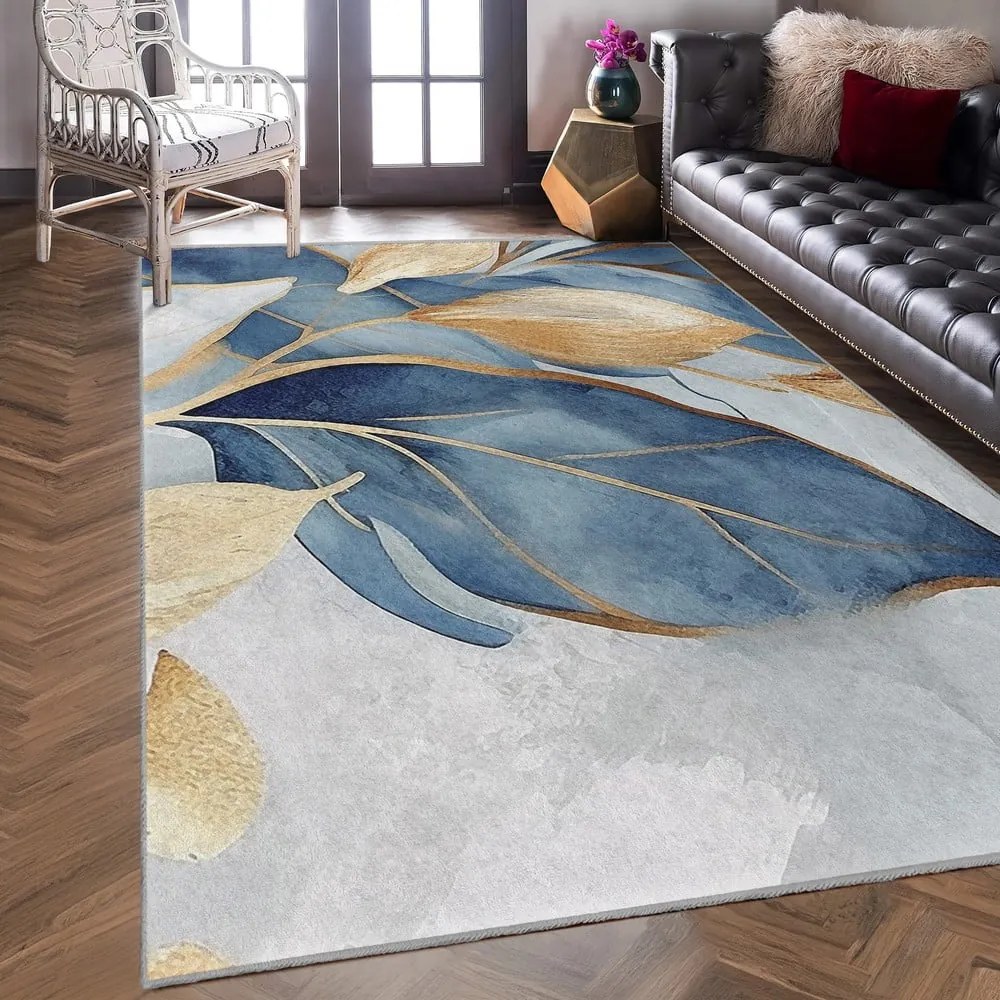 Prateľný koberec v modrej a zlatej farbe 160x230 cm Golden Leaves – Mila Home