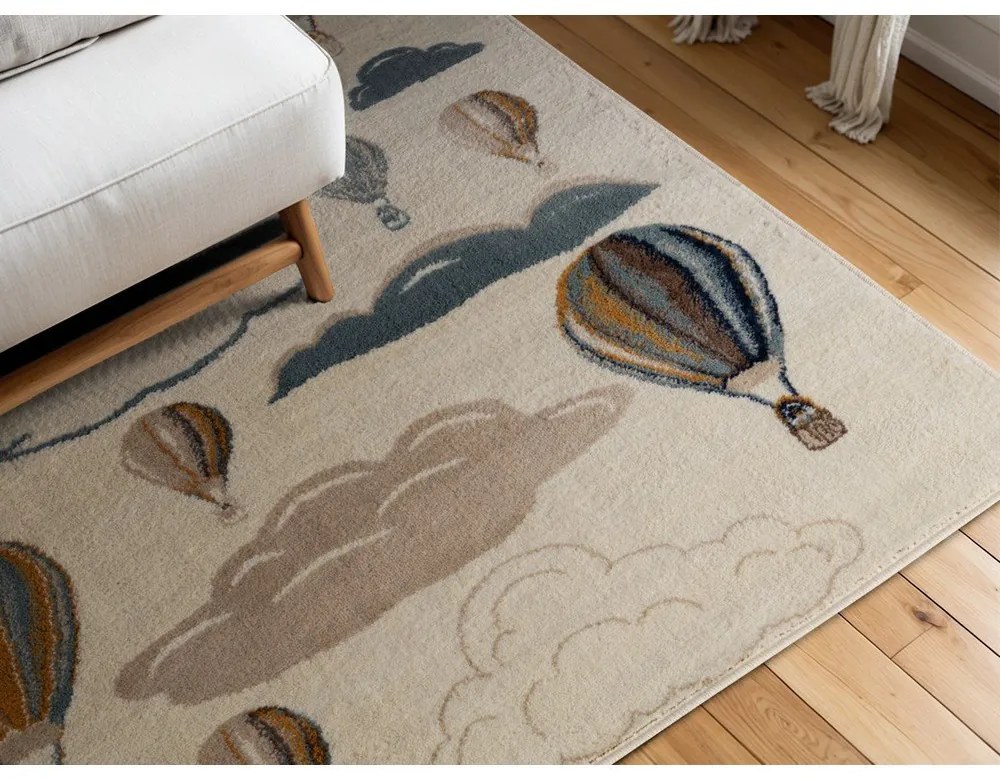 Krémový detský koberec 120x170 cm Hot Air Balloon – Hanse Home