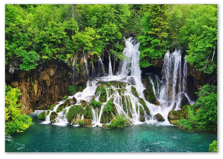 Foto obraz sklenený horizontálne Vodopád v horách pl-osh-100x70-f-85137892