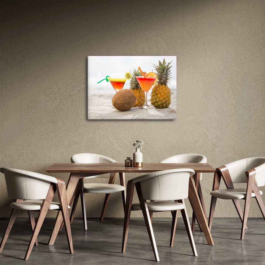 Obraz ananásov a pohárov na pláži (70x50 cm)