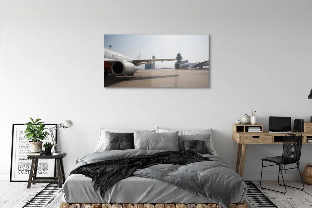 Obraz plexi Letiskové lietadla neba budovy 125x50 cm